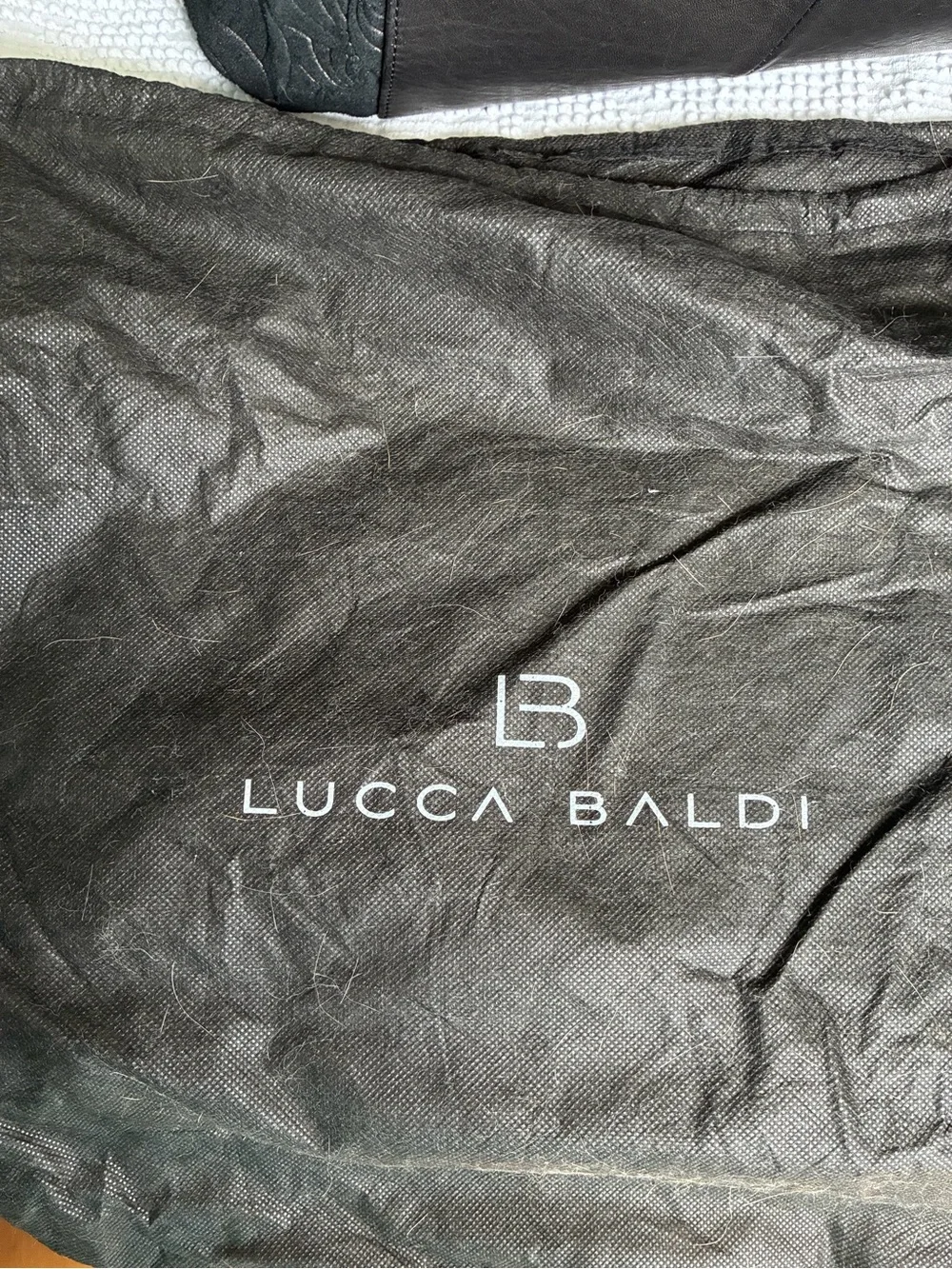Lucca Baldi black embossed suede hobo bag